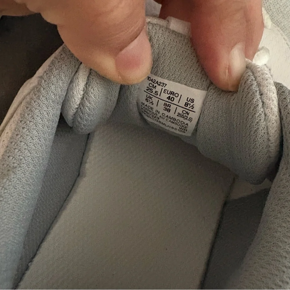 Asics White Athletic Shoes with Silver Logo
